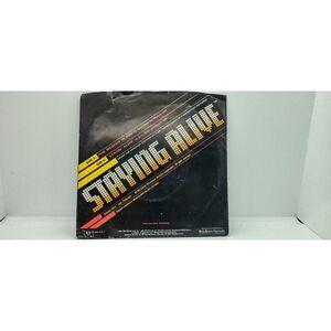 Bee Gees "Staying Alive" and The Woman In You" 45 RSO / Polygram